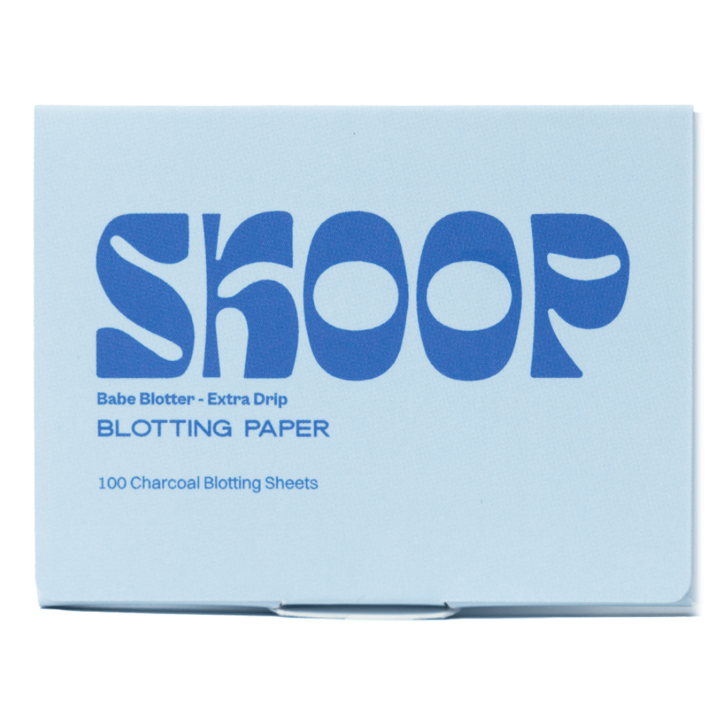 Skoop Babe Blotter Extra Drip Blotting Paper packaging in light blue with bold cobalt blue typography. Contains 100 charcoal-infused blotting sheets designed to absorb excess oil and impurities, perfect for refreshing skin and maintaining a matte complexion on the go.