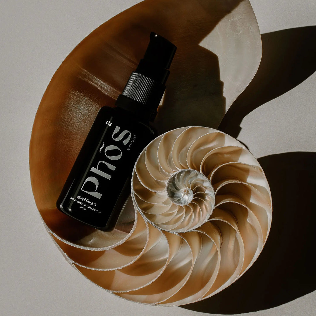 Phos Studio Bakuchiol Retinol Alternative with Kojic Acid in a sleek black 30ml glass bottle, available at VAMS Beauty, an Australian online beauty shop stocking Australian skincare product.