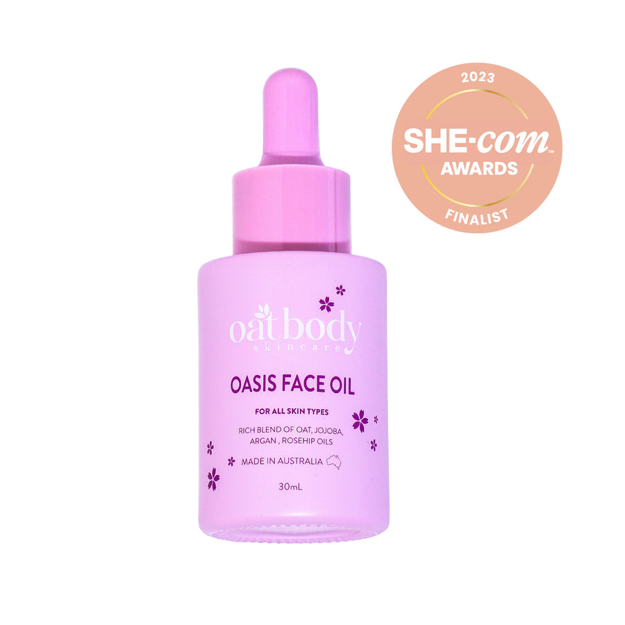 Oatbody Oasis Face Oil in a pink dropper bottle, labeled as a finalist for the 2023 SHE-Com Awards, featuring a rich blend of oat, jojoba, argan, and rosehip oils, designed for all skin types and made in Australia.