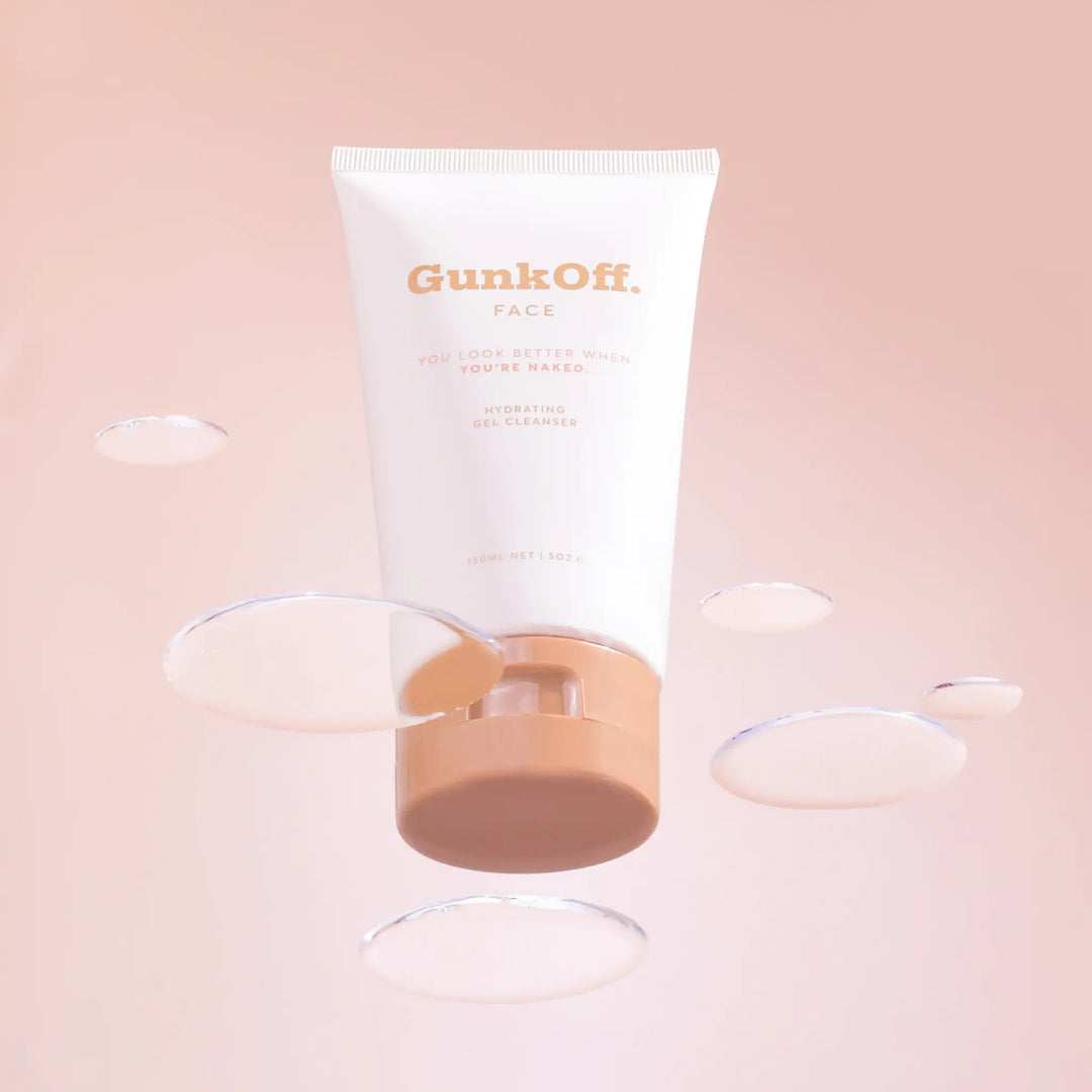 Floating GunkOff Hydrating Gel Cleanser surrounded by water-like gel droplets, showcasing its gentle and hydrating formula. An Australian beauty product perfect for sensitive skin.