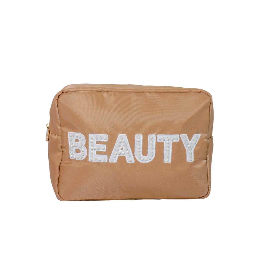 Large beige makeup travel bag with 'BEAUTY' embroidered in white letters, ideal for storing cosmetics and skincare products for travel and everyday use.