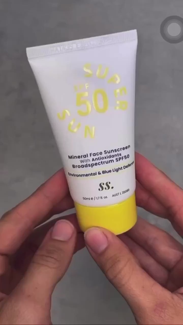 mineral sunscreen application on hand.