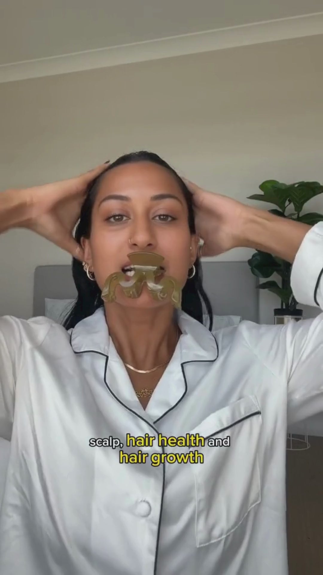 A woman using turmeric Ayurvedic mask, stocked at VAMS Beauty, an online store selling Australian made skincare and beauty products.