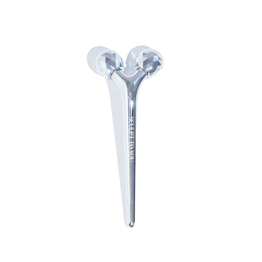 Sculpt To You facial massage roller for contouring and firming, available at VAMS Beauty Australian Skincare & Beauty Shop. This stainless steel tool enhances blood circulation, reduces puffiness, and sculpts facial features for a rejuvenated appearance.