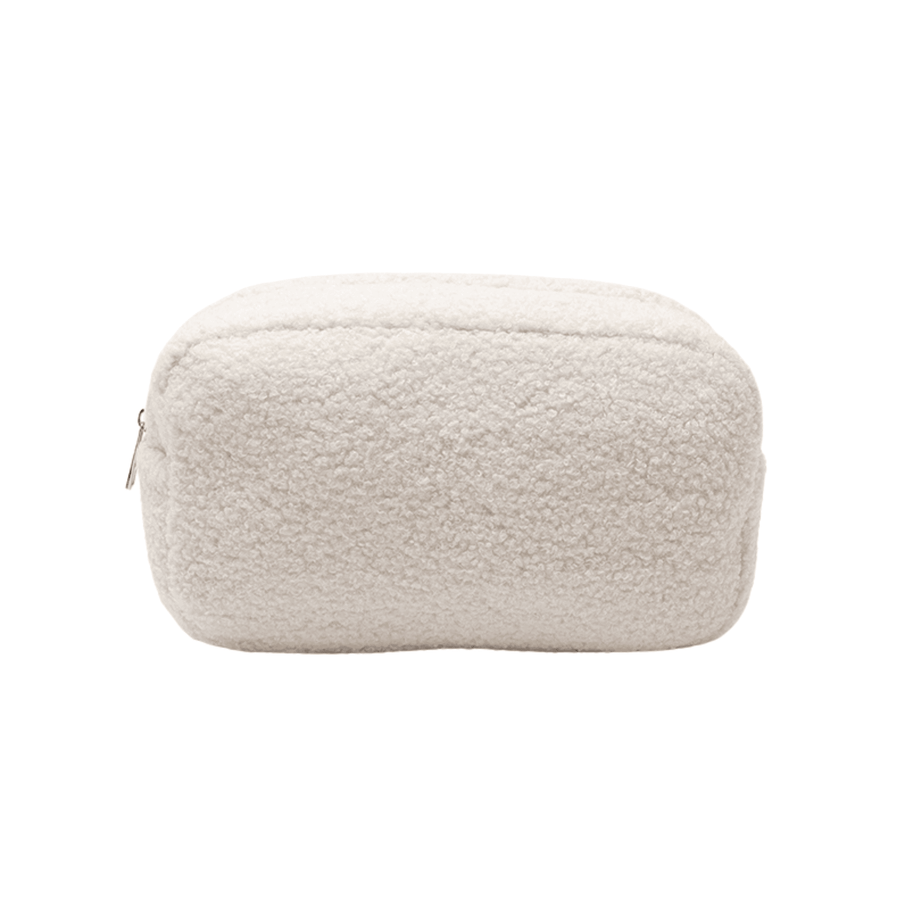 White teddy cosmetic bag with a soft plush texture, featuring a minimalist design and gold zipper, perfect for storing makeup and travel essentials.