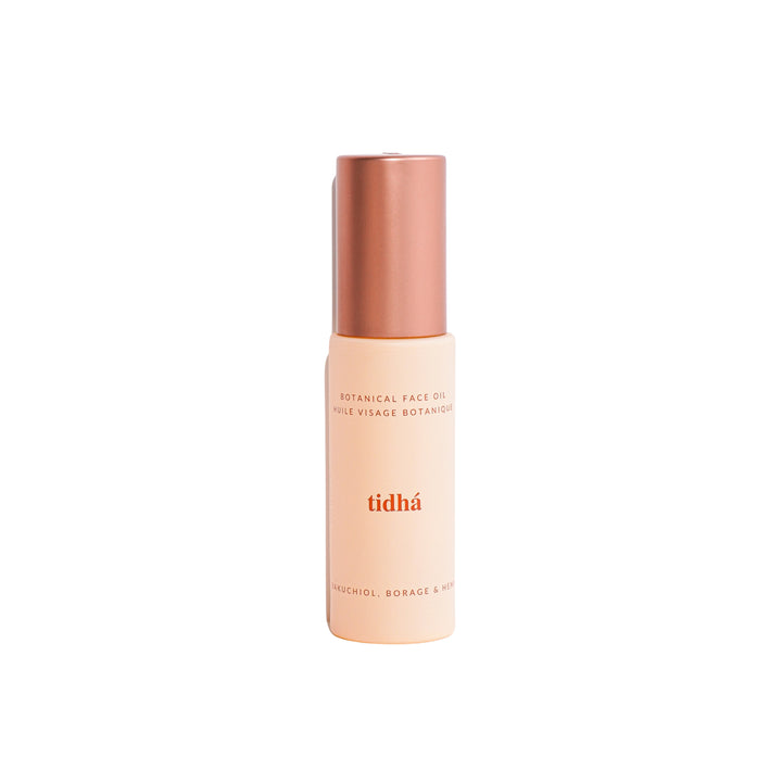 Vegan Retinol Face Serum Oil by Tidha featuring botanical ingredients Bakuchiol, Borage, and Hemp, in a sleek, rose-gold capped bottle